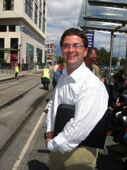 Main organizer and project coordinator Kevin Harrington at a tram stop in Tallaght